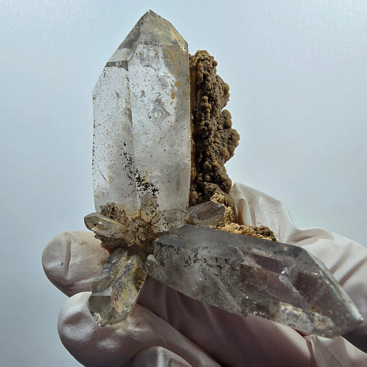 Spécimen de quartz fumé, hématite et calcite, squelette fantôme, Goboboseb, Namibie, 60 x 54 x 36 mm