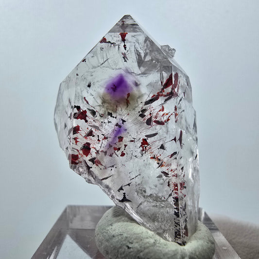 Améthyste fantôme Harlequin avec hématite, mine Streep, Goboboseb, Namibie, 37 x 26 x 14 mm 
