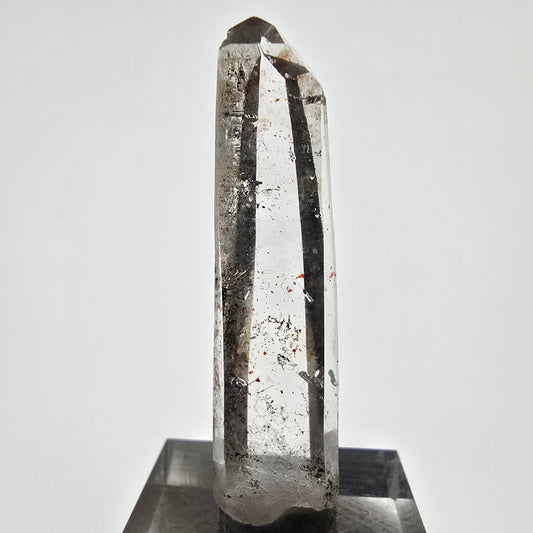Quartz fumé fantôme lémurien, poche Valentine à pointe d'hématite, Namibie, 47 x 12 x 8 mm 