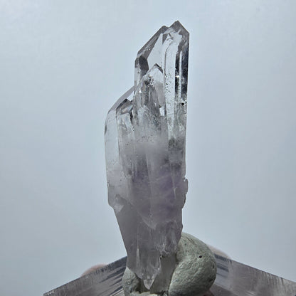 Améthyste fantôme avec hématite, mine Streep, Goboboseb, Namibie, 44 x 16 x 10 mm 