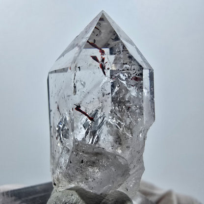 Quartz Harlequin Enhydro, Quartz Hématite Streep Mine, Goboboseb, Namibie 36 x 18 x 13 mm 